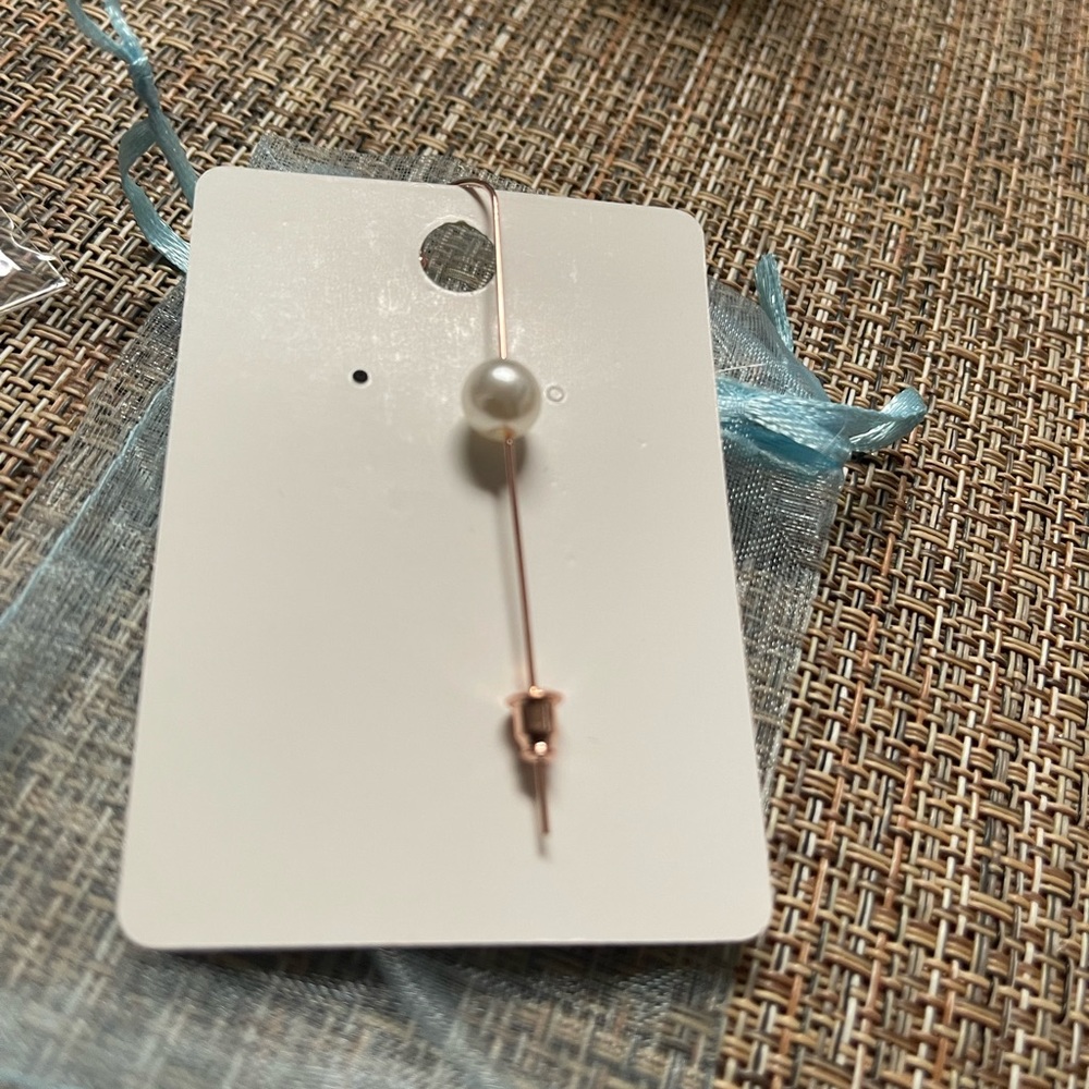 single pearl earring